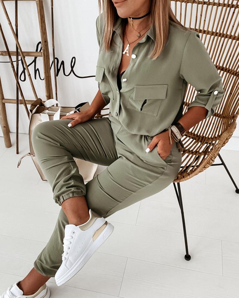 Comfortabele groene dames jumpsuit met lange mouwen en elastische taille, ideaal voor casual kantoorstijl.