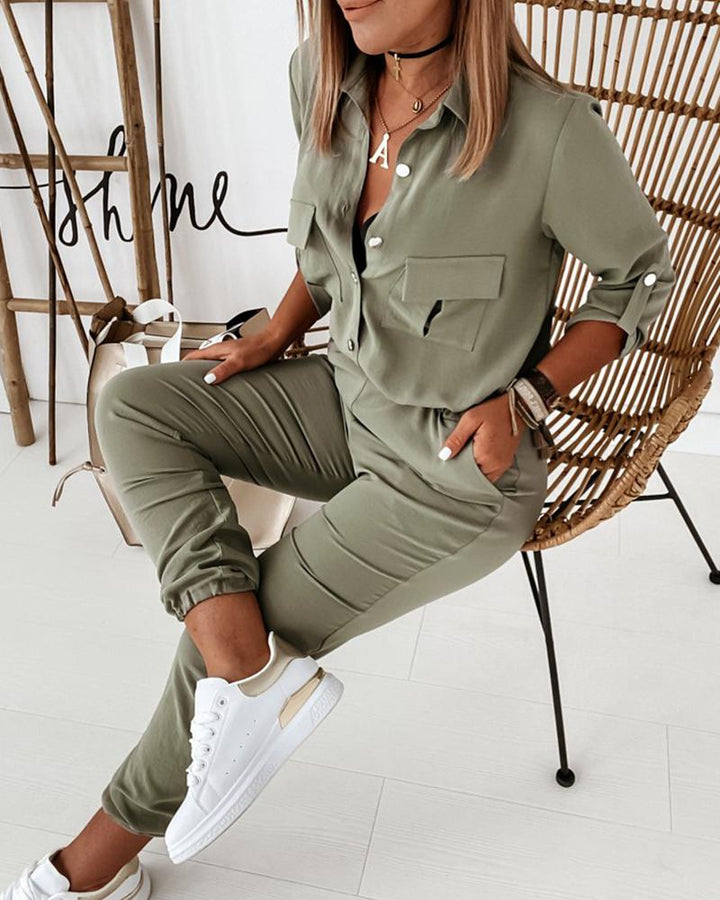 Comfortabele groene dames jumpsuit met lange mouwen en elastische taille, ideaal voor casual kantoorstijl.