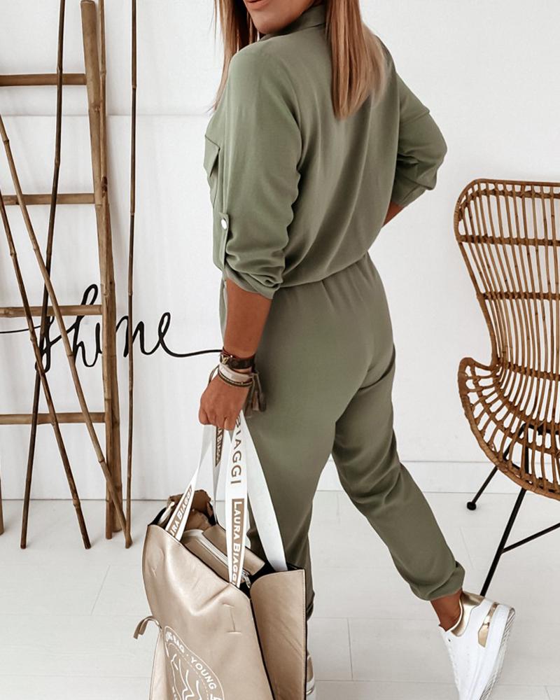 Veelzijdige groene dames jumpsuit met lange mouwen en elastische taille, geschikt voor zowel voorjaar als najaar.