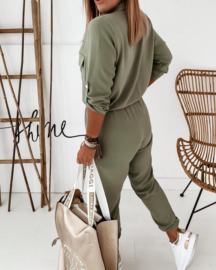 Veelzijdige groene dames jumpsuit met lange mouwen en elastische taille, geschikt voor zowel voorjaar als najaar.