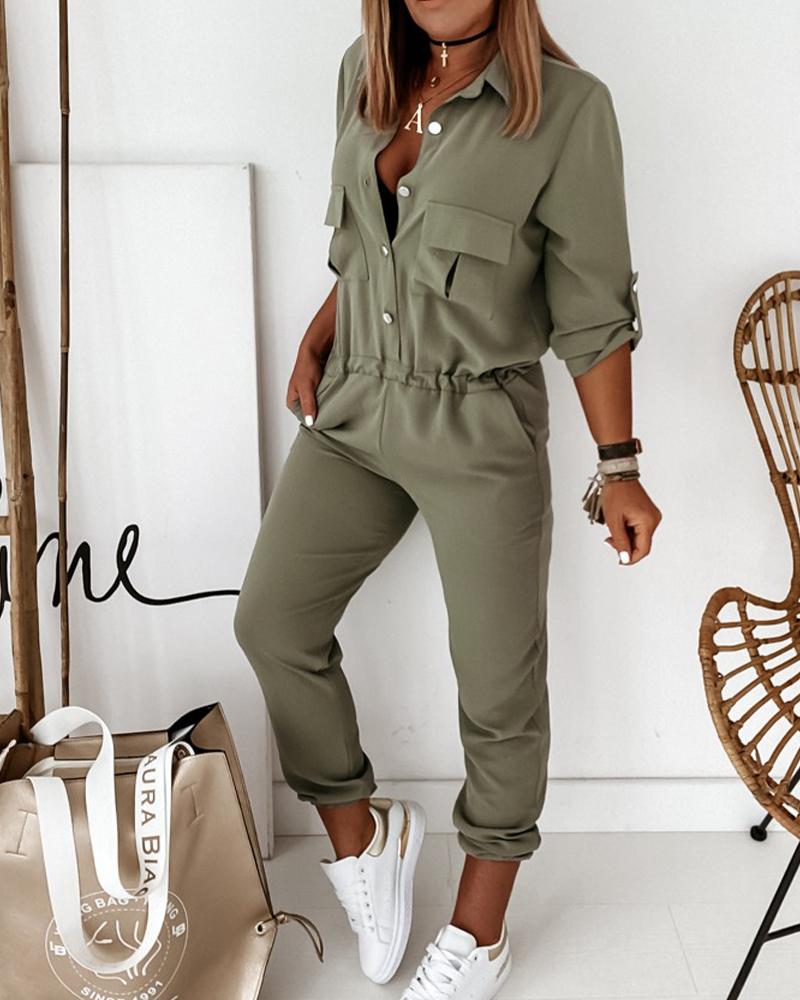 Stijlvolle groene dames jumpsuit met lange mouwen en elastische taille, chique en comfortabel voor elke gelegenheid.