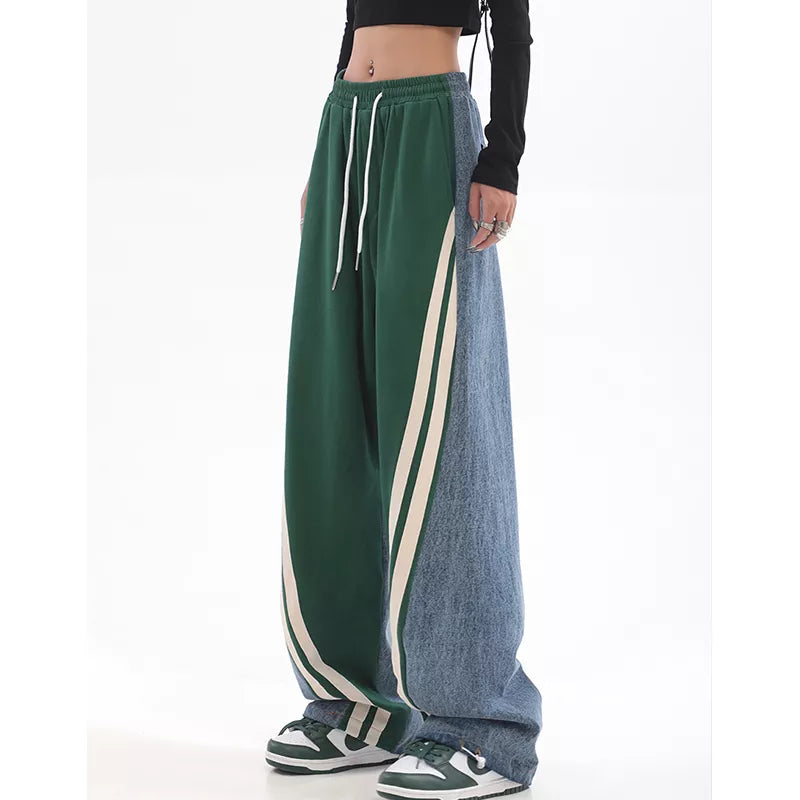 Groene dames joggingbroek met hoge taille. Comfortabel en trendy voor sport of vrije tijd.