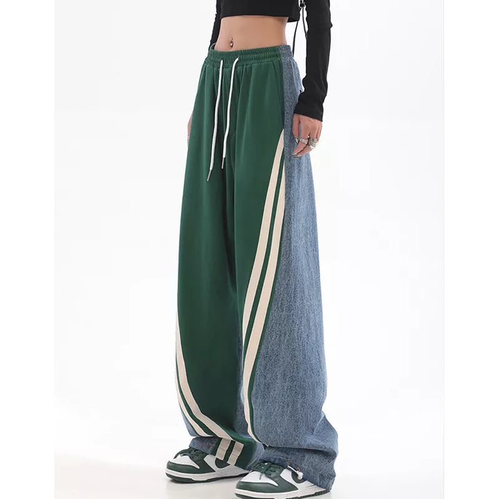 Groene dames joggingbroek met hoge taille. Comfortabel en trendy voor sport of vrije tijd.