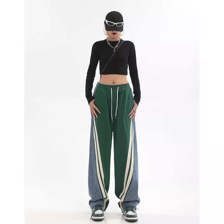Vrijetijdskleding: comfortabele groene dames joggingbroek met hoge taille. Trendy en sportief.