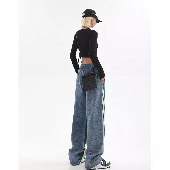 Zwarte joggingbroek dames, achterkant detail. Hoge taille en comfortabele pasvorm voor elke dag.