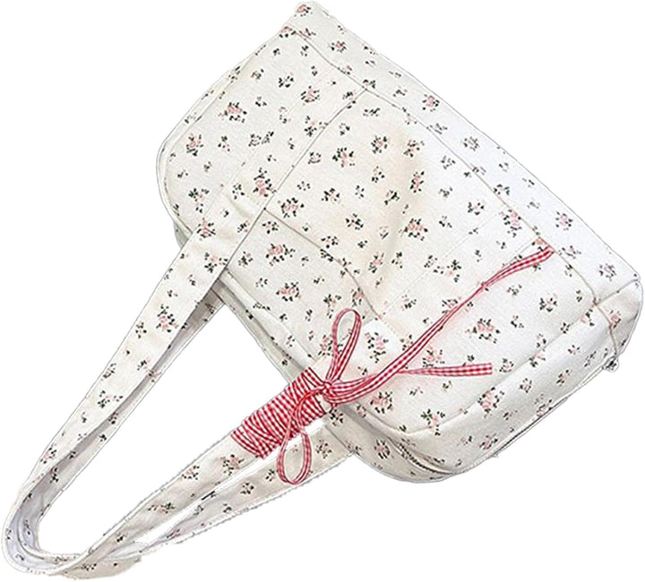 Grote dames canvas weekendtas met elegant lintaccent, perfect voor weekendjes weg of korte reizen.