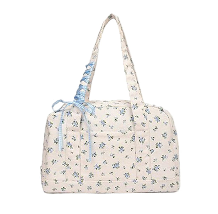 Dames mode tas van canvas met striklint, perfecte mix van stijl en functionaliteit voor reizen.
