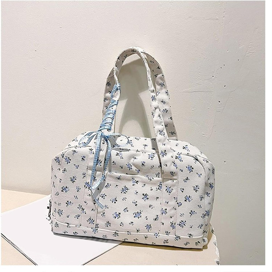 Roze dames reistas van canvas met lint, veelzijdig en chique voor elk weekendje weg.