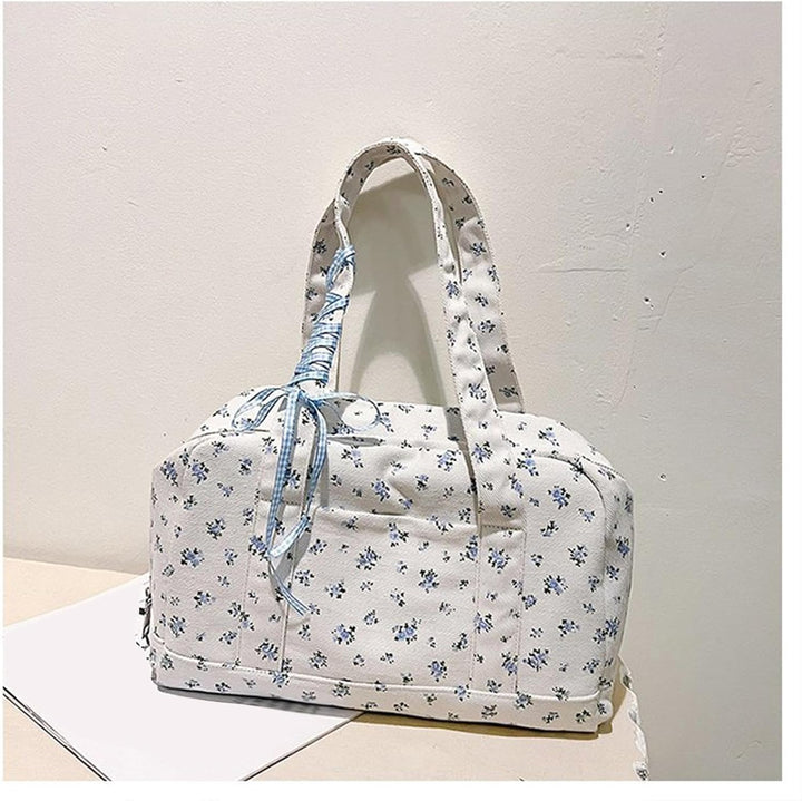 Roze dames reistas van canvas met lint, veelzijdig en chique voor elk weekendje weg.