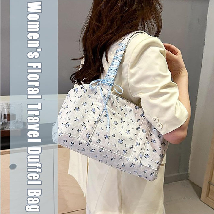 Blauwe canvas tas met lintaccent, een elegante duffeltas voor dames, geschikt voor elke reis.