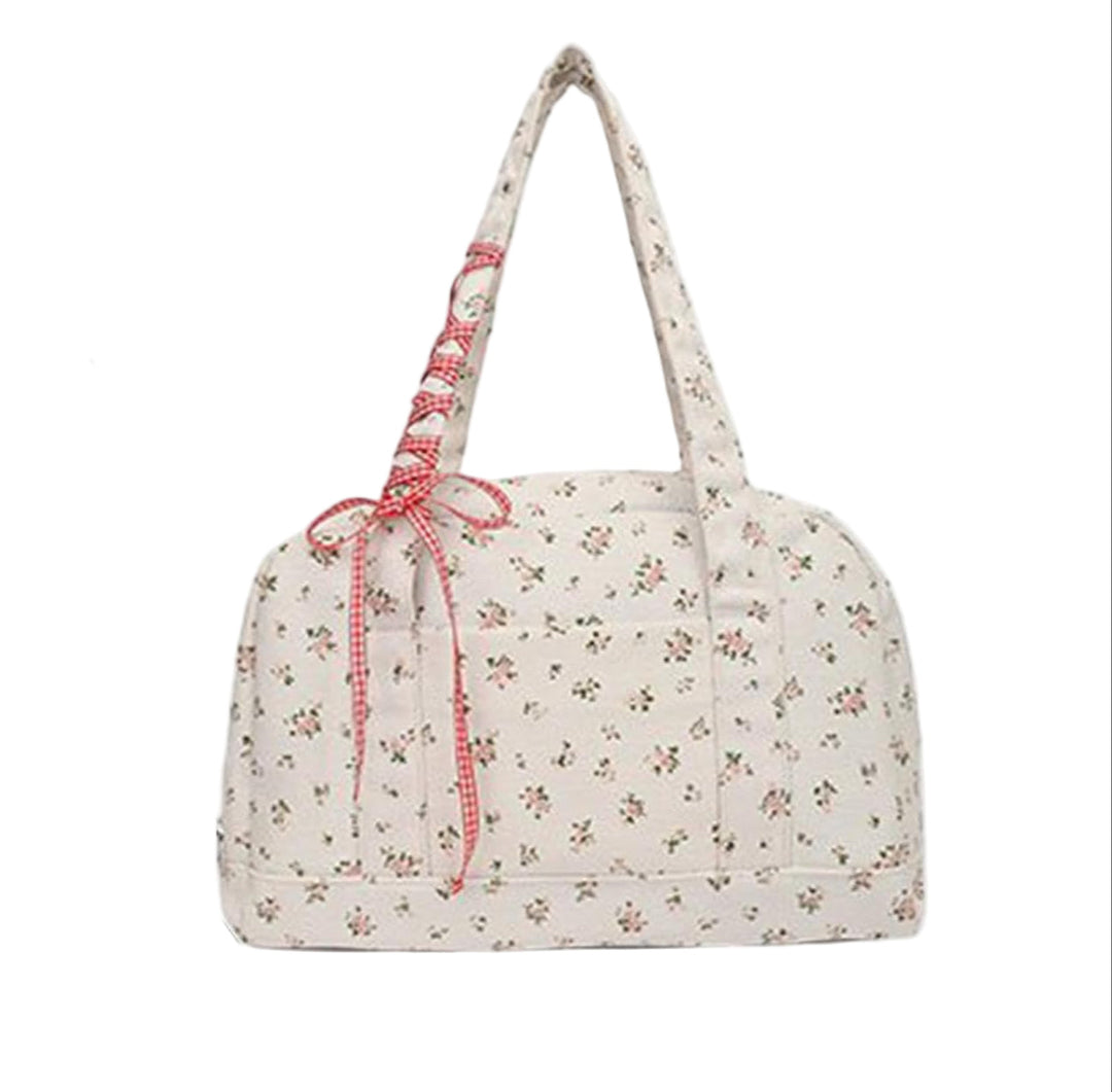 Dames canvas weekendtas met striklint, veelzijdige duffeltas voor weekendje weg, in roze of blauw.