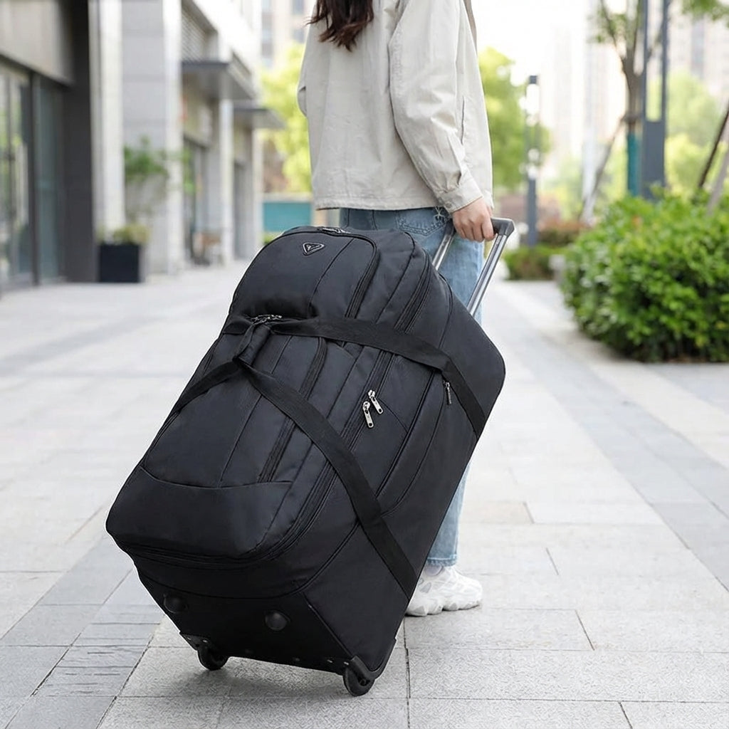 Grote opvouwbare reistrolley met stevige wielen, ideaal voor ruim bagagegemak op reis.