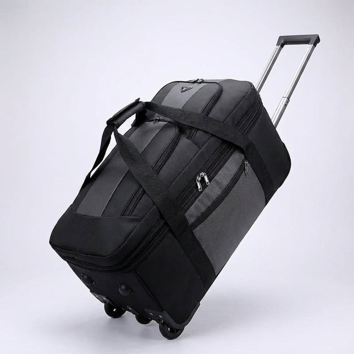 Opvouwbare reistrolley, zowel ruim als compact, met wielen voor comfortabel vervoer van bagage.