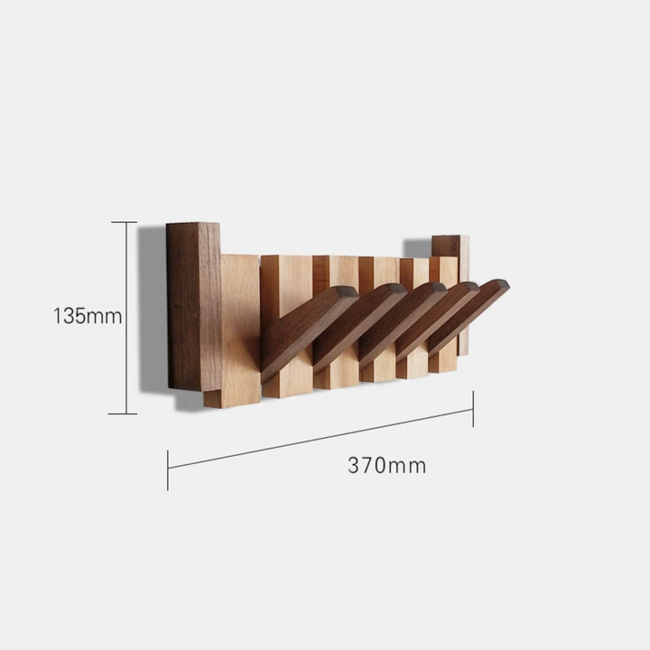Handgemaakte houten kapstok in piano design met elegante, pianotoetsen uitstraling. Perfect voor stijlvolle jassenopslag.