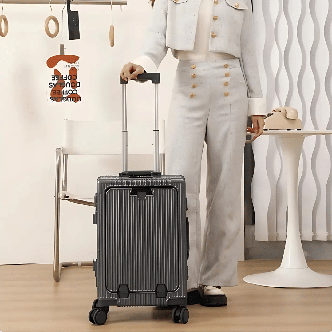 Slimme hardcase handbagage koffer met USB-poort en laptoptas voor zakenreizen.