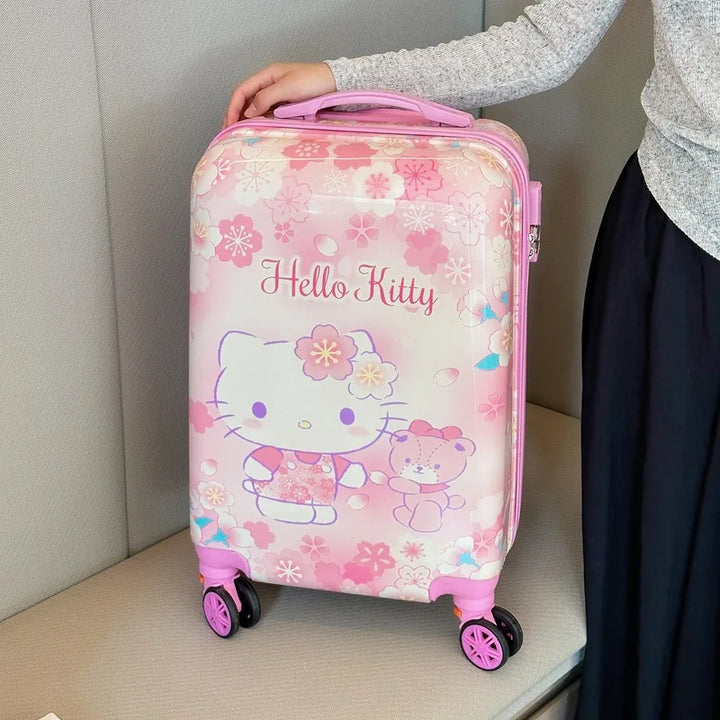Duurzame kinder hardshell koffer met Hello Kitty en Kuromi figuren, ideaal als handbagage voor jonge reizigers.