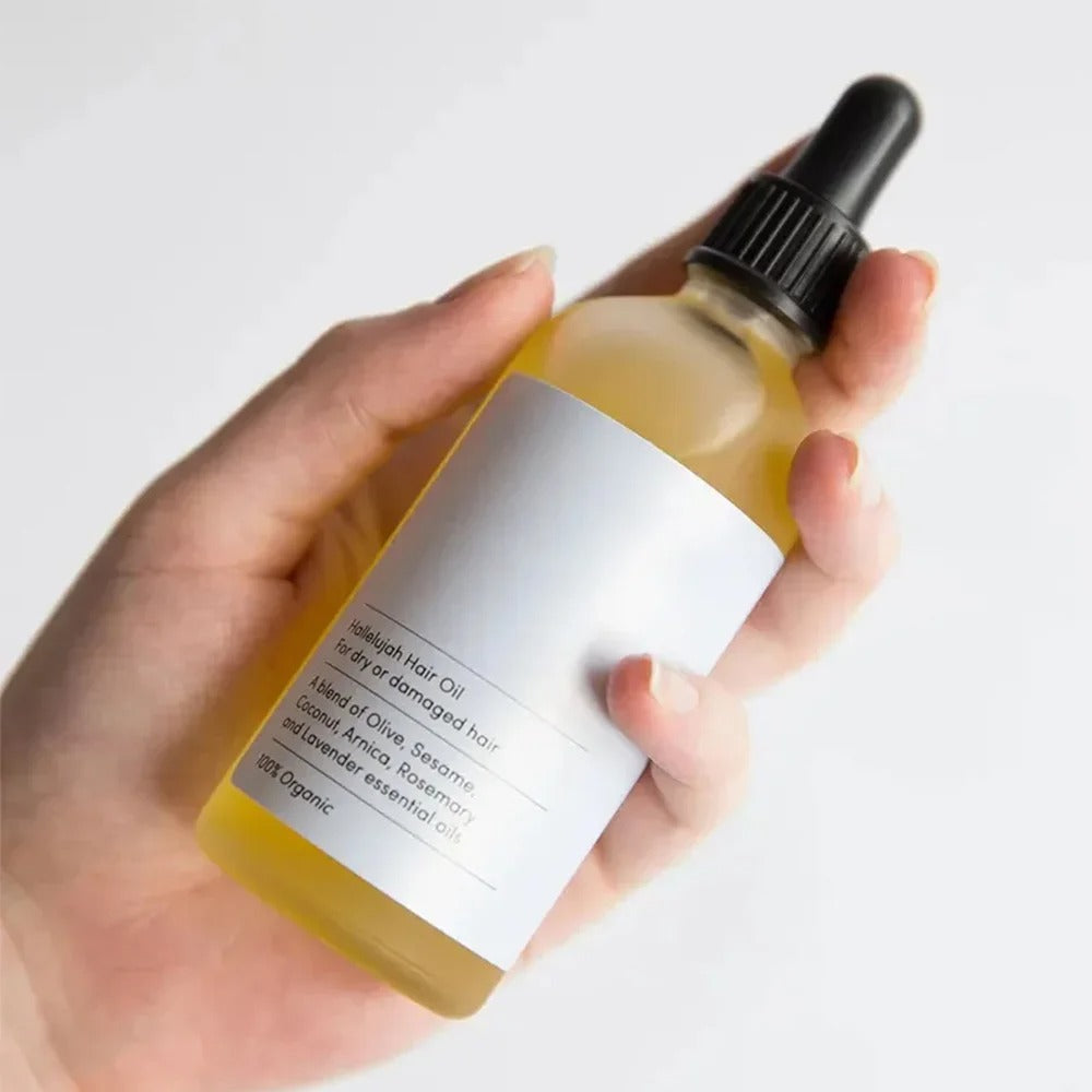 Vegan & biologische rozemarijn haargroei olie voor vrouwen. Natuurlijke verzorging tegen haaruitval; sterker, voller haar.