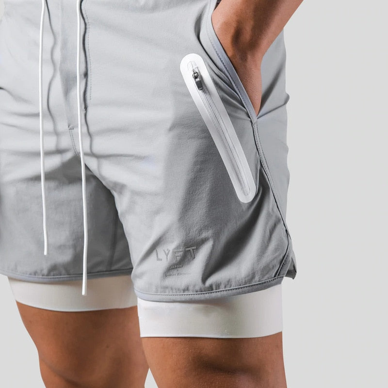 Heren sportkleding: 2-in-1 hardloopbroek met ondersteunende compressie binnenbroek, ademend en flexibel.