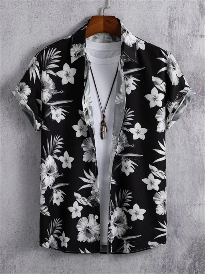Casual heren Hawaii shirt, kleurrijke bloemenprint, voor een complete vakantie outfit.