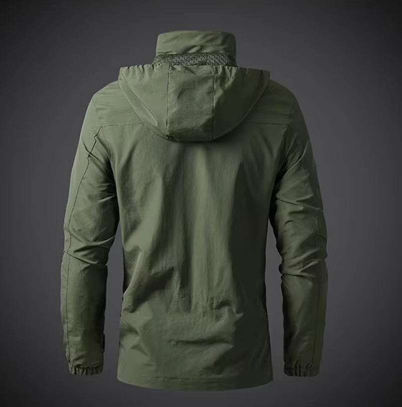 Detail van de Arvid outdoorjas: hoogwaardige waterdichte ritsen en winddichte stof voor optimale bescherming.