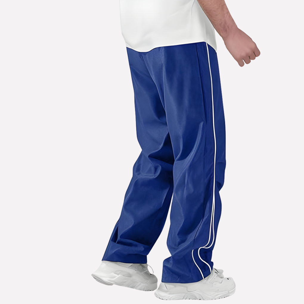 Heren athleisure joggingbroek AM1 in polyester, comfortabel voor sport en dagelijkse kleding.