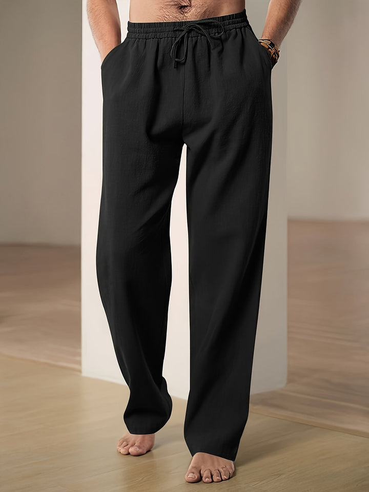 Relaxte heren trekkoordbroek met brede pijpen, perfect voor casual lente- en zomeroutfits.