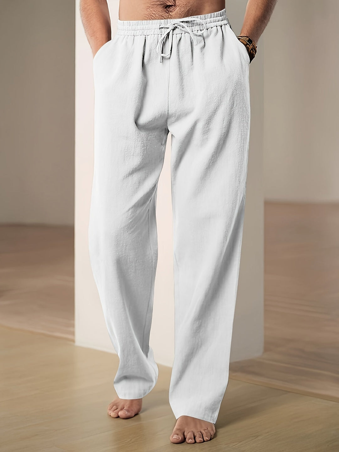 Stijlvolle herenbroek, type chino, met trekkoord en wijde pijpen voor ultiem draagcomfort.