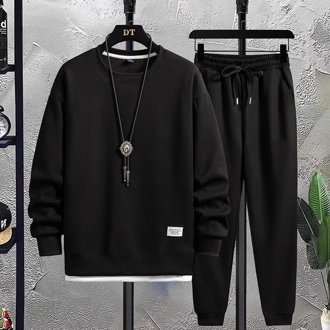 Zacht heren joggingpak, perfecte herenkleding voor ontspanning en casual activiteiten. Stijlvol en veelzijdig.