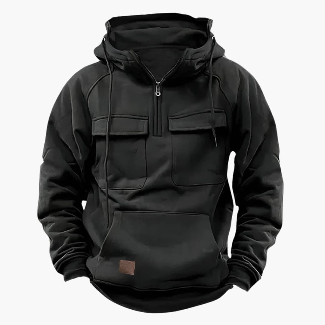 Gedetailleerde weergave van de heren half-zip hoodie met borstzakken en comfortabele pasvorm.