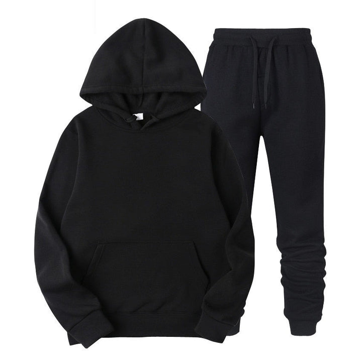 Man draagt comfortabele heren jogger sportkledingset, casual en stijlvolle vrijetijdskleding.