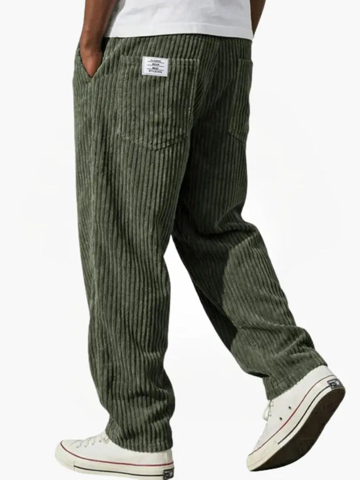 Detail: Heren corduroy broek met elastische tailleband, losse fit en fijne ribstof, grijs.