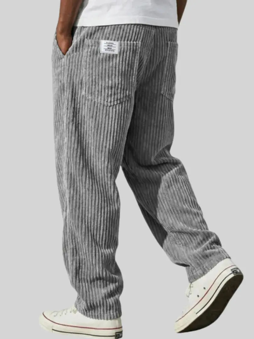 Stijlvolle blauwe heren corduroy broek met loose fit en elastische taille, ideaal voor een casual look.