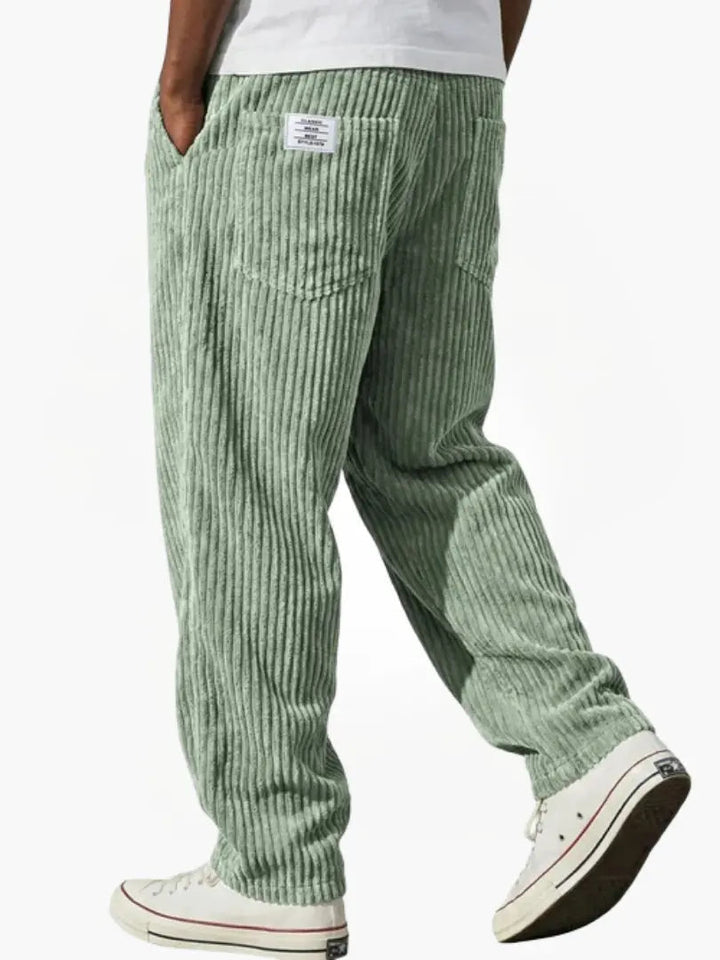 Comfortabele heren corduroy broek met elastische taille en ruime loose fit, verkrijgbaar in grijs, blauw, kaki.