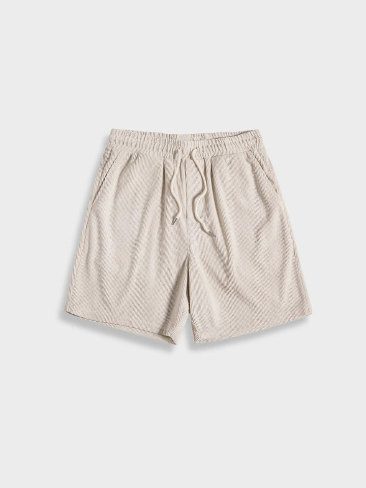 Close-up corduroy stof en knoopsluiting van heren zomerset Sven, comfortabel, casual en stijlvol voor de zomer.