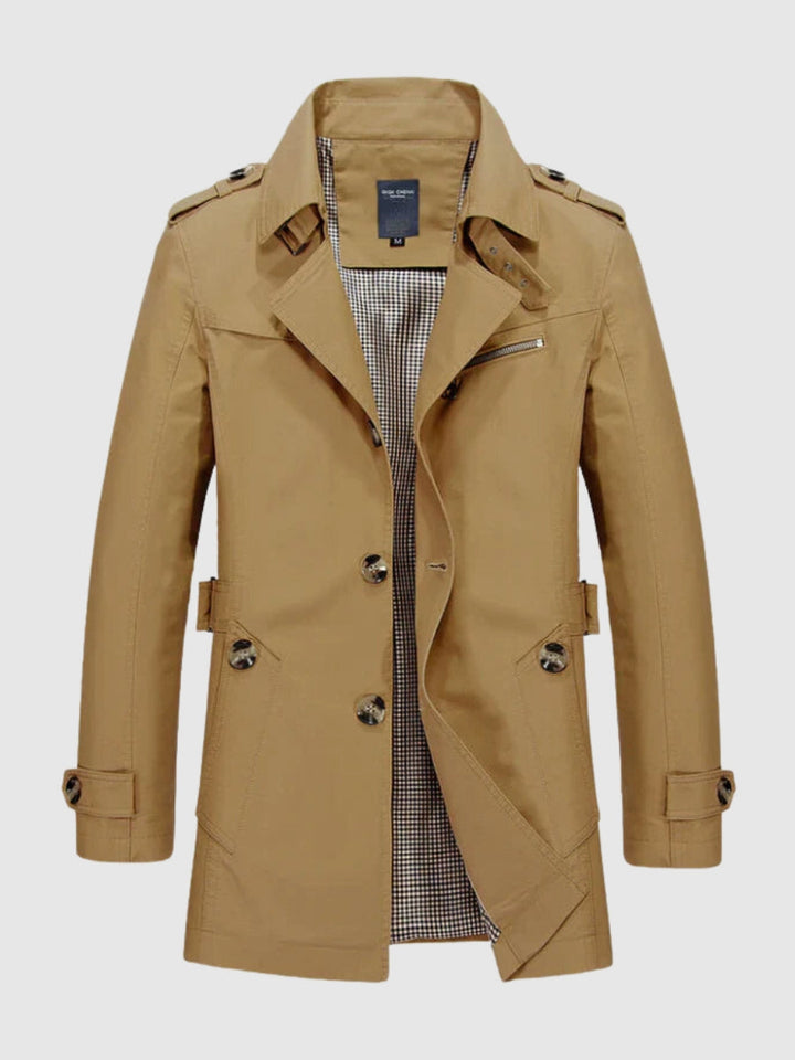 Stijlvolle heren trenchcoat met dubbele rij knopen. Modieus en functioneel voor diverse seizoenen.