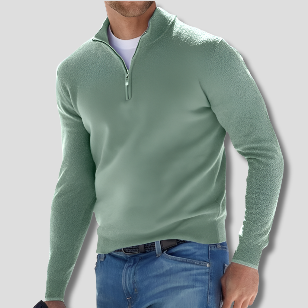 Hoogwaardige katoenen heren pullover, gebreid met ritskraag, combineert comfort en klasse.