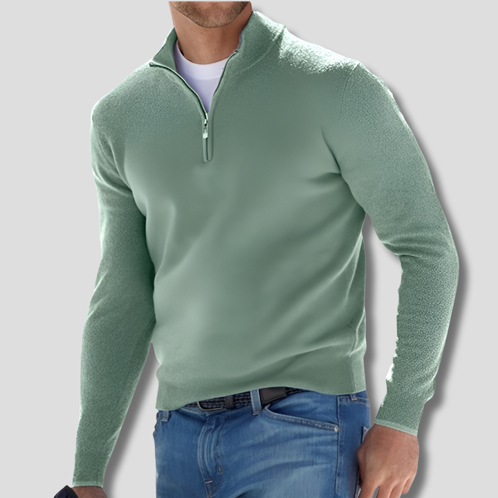 Hoogwaardige katoenen heren pullover, gebreid met ritskraag, combineert comfort en klasse.