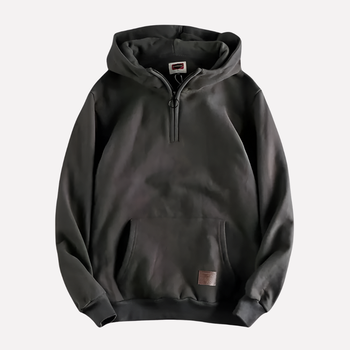 Stijlvolle heren half-zip hoodie voor een relaxte look; veelzijdig voor sportief of dagelijks comfort.