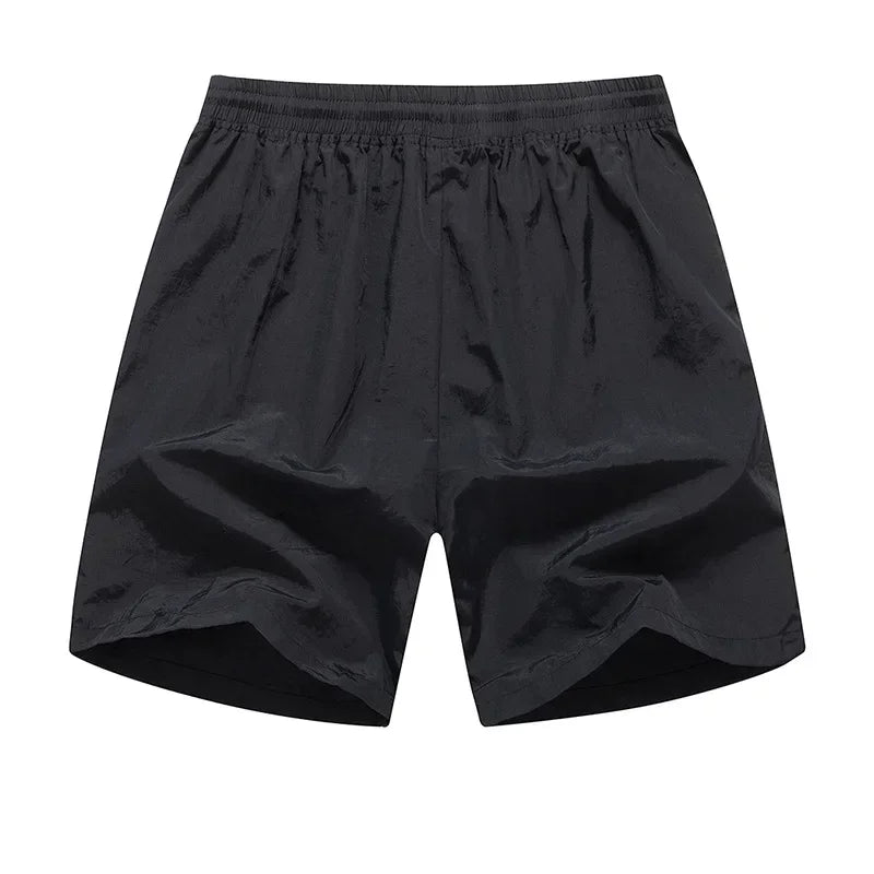 Man rent in Nikoas heren hardloopshorts, ideaal voor fitness, training en actieve zomerse vrijetijdskleding.