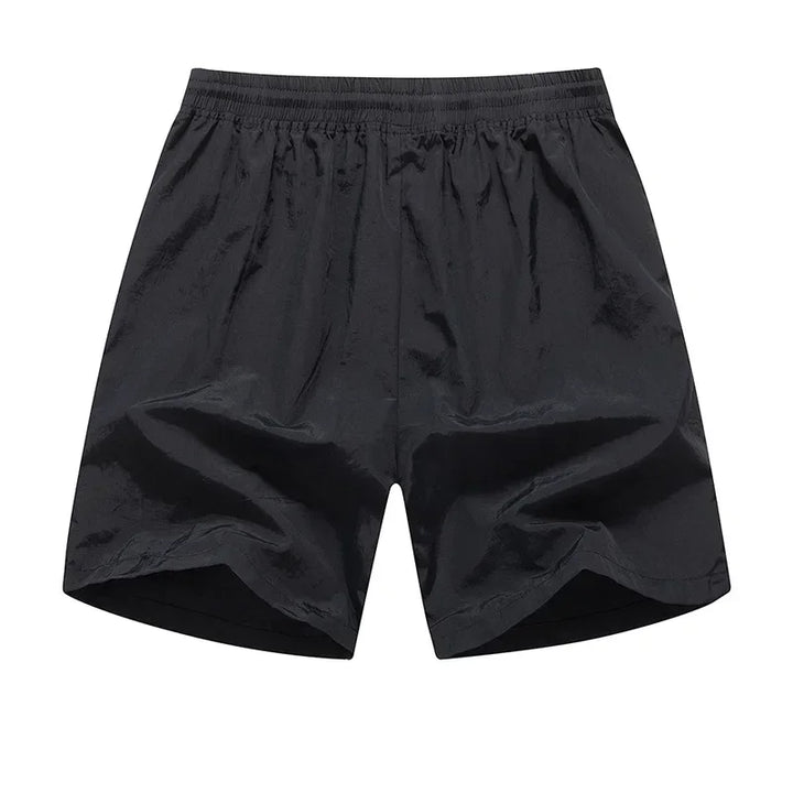 Man rent in Nikoas heren hardloopshorts, ideaal voor fitness, training en actieve zomerse vrijetijdskleding.