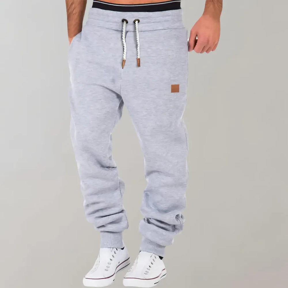 Sportieve heren joggingbroek van zachte katoenmix, casual stijl perfect voor thuis of onderweg.