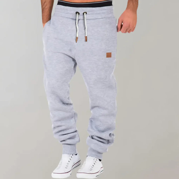 Sportieve heren joggingbroek van zachte katoenmix, casual stijl perfect voor thuis of onderweg.