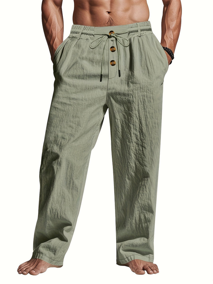 Comfortabele heren lange broek met ontspannen fit, trekkoord en rechte pijpen. Geschikt voor casual herenmode.