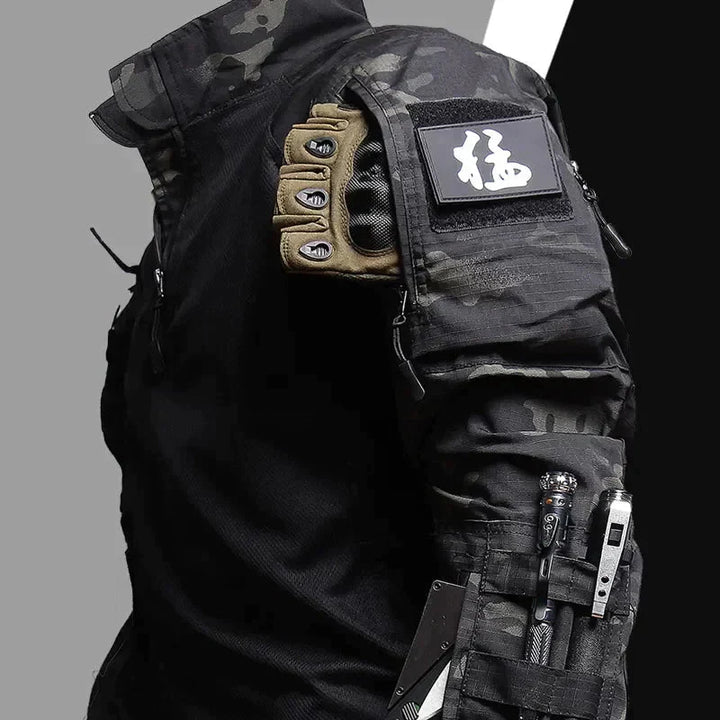 Groene/zwarte tactische heren leger set Logan. Comfortabel en weerbestendig voor avontuurlijke outdoor sporten.