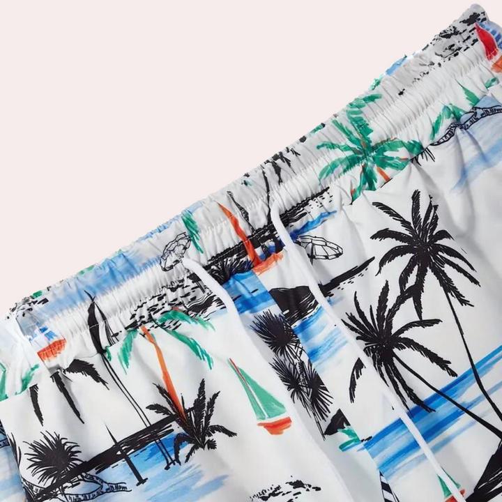 Comfortabele heren loungewear set voor de zomer, bestaande uit een ademend t-shirt en relaxte shorts.