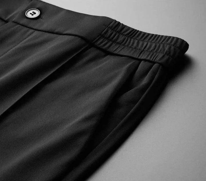 Comfortabele heren tweedelige set: zacht poloshirt en relaxte pantalon voor vrije tijd.