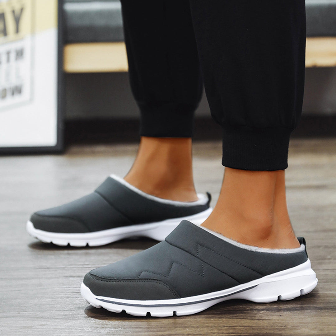 Antislipzool van heren orthopedische pantoffels, biedt stevigheid en comfort, perfect voor huis en winter.
