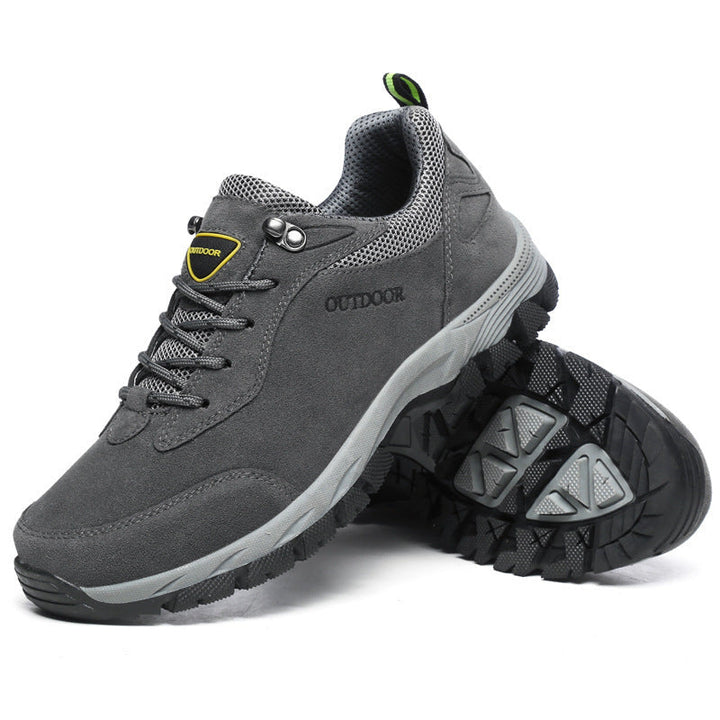 Grijs-zwarte orthopedische heren wandelschoenen voor optimale voetondersteuning en duurzaam comfort tijdens elke stap.