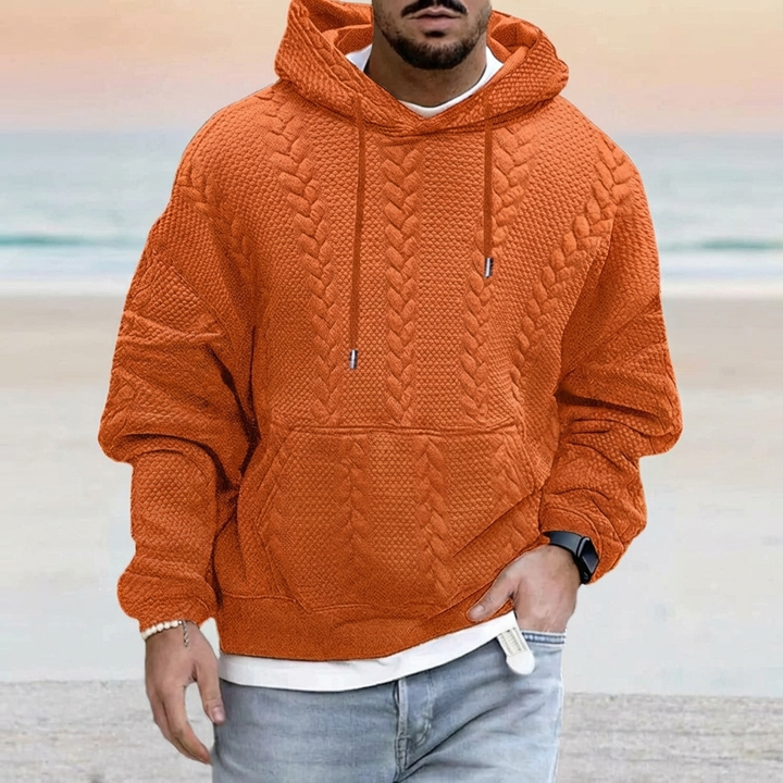 De zachte stof en comfort van deze heren oversized hoodie, perfect voor casual dagelijkse kleding en ontspanning.