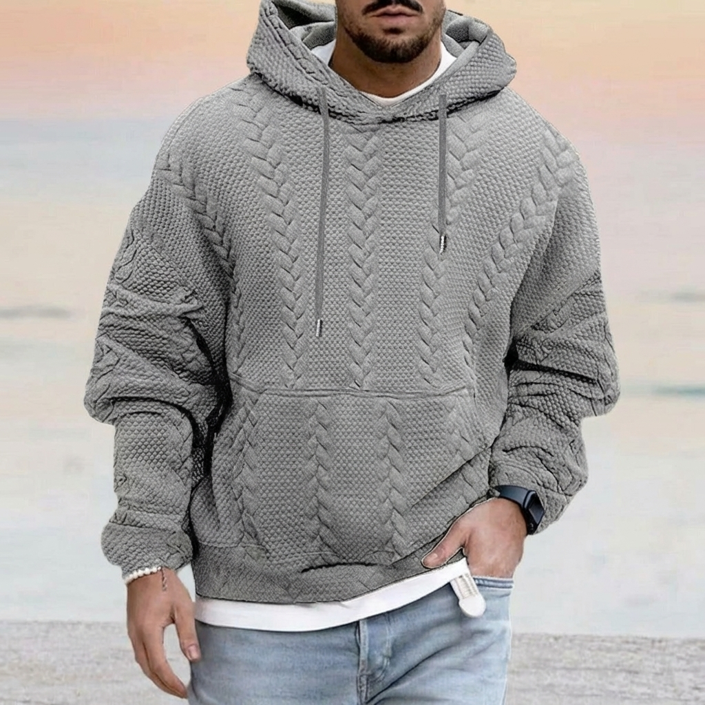 De achterzijde van een casual heren oversized hoodie, met een relaxte pasvorm voor ultiem comfort en stijl.